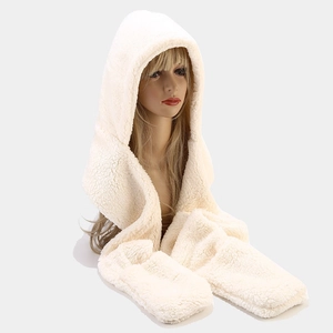 Close-up of beige plush three-in-one hoodie scarf with integrated gloves and hood