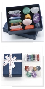 Macro view of 15 pieces crystal set with hexagonal columns and tumbled stones in a gift box