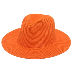 Detailed weave of a vibrant orange Panama straw fedora hat on a clean white background