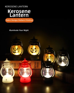 Retro Halloween LED kerosene lanterns with pumpkin patterns displayed on vintage books