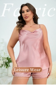 Detail of pink satin plus size two-piece sleepwear set with silk-like finish and drape