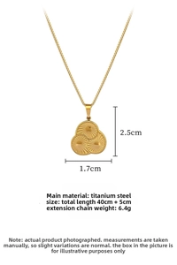 Detail of gold titanium steel necklace featuring overlapping circular textured pendant design