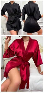 Detail of silk satin robes with wide half sleeves and tassels on the tie belt