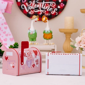 Pink and white metal mailbox gift boxes with heart patterns for Valentine atmosphere