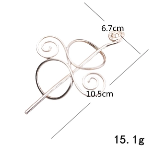 Detailed view of Viking metal hair pin with Celtic knots showing 10.5cm length dimensions