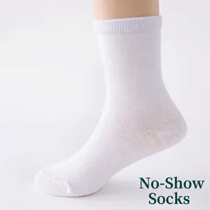 Children's white mid-calf cotton socks with elastic ribbed cuffs on foot model