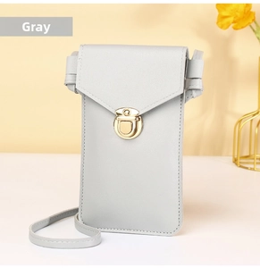 Detail of gray PU leather crossbody phone bag with gold circular buckle and knot design