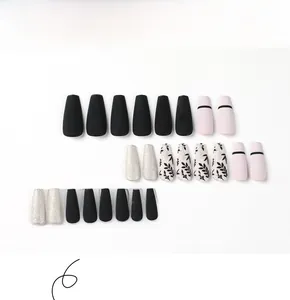 Detailed set of long coffin press-on nails with matte black, pink, and silver glitter finish