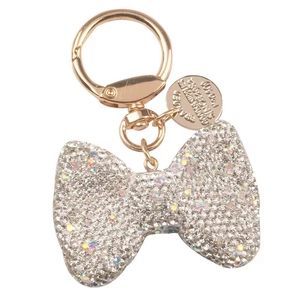 Portachiavi a fiocco con strass e gancio in oro rosa con ciondolo in metallo inciso