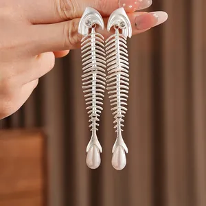 Silver fishbone drop earrings with sparkling zircon and white teardrop pearl accents