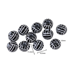 Detail of volleyball acrylic beads showing 3mm hole and 11.2x10.3mm dimensions