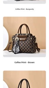 Detailed view of checkered handbag with silk scarf handle and metal logo plaque