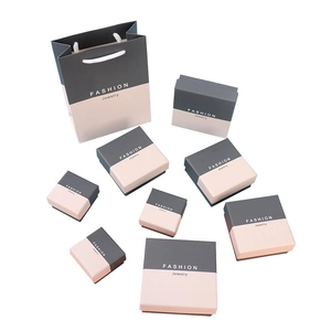 Minimalist pink and grey jewelry gift box set with matching paper shopping bag