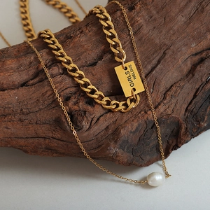 French chic layered gold necklace set with engraved square tag and freshwater pearl
