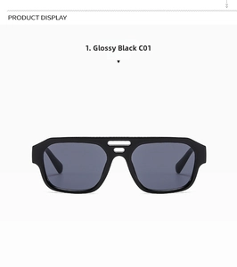 Detail view of glossy black full-frame double-bridge pilot sunglasses with dark grey lenses