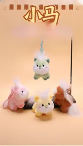 Detailed view of colorful plush pony keychains with spiral straps in various pastel colors