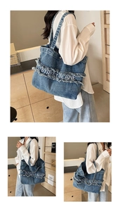 Détail du sac cabas en jean bleu avec bords effilochés et broderie de lettres Street Blane