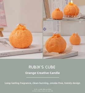 Vista macro de velas aromáticas de naranja realistas con textura de piel detallada y mecha