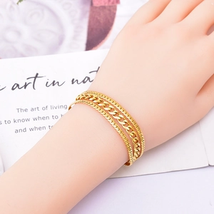Three-layer gold titanium steel snake chain bracelet for women with elegant layered design