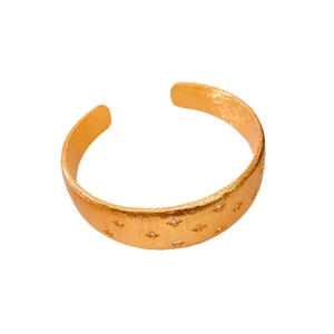 18k gold plated open bangle featuring star motifs and sparkling zircon stones