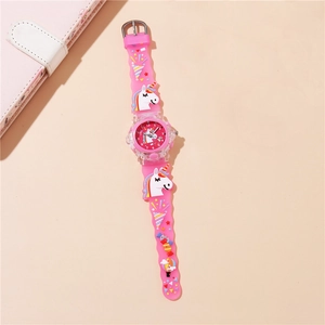 Detailed view of pink unicorn kids watch with wavy silicone strap and rainbow patterns