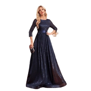 Elegant dark blue sequin evening gown with long sleeves and high waist satin belt