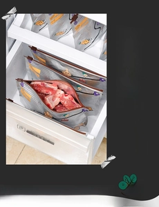 Detail of sealed aluminum foil freezer bag with ribs inside stored in a refrigerator