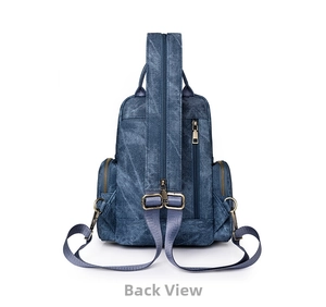 Back view of blue vintage PU leather backpack with bronze zippers and adjustable straps
