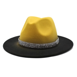 Two-tone wool felt fedora hat in yellow and black with sparkling rhinestone band trim
