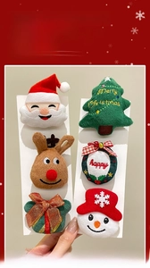 Detail of plush Christmas pins set including Santa, Reindeer and Snowman with embroidery