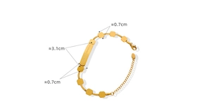 Detailed close-up of 18K gold plated stainless steel bracelet with square charms