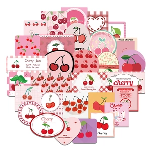 Gros plan d'autocollants cerise imperméables de formes variées pour agendas et ordinateurs