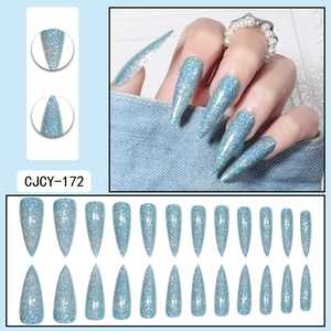 Detail of light blue glitter stiletto press-on nails including 24 pieces of various sizes