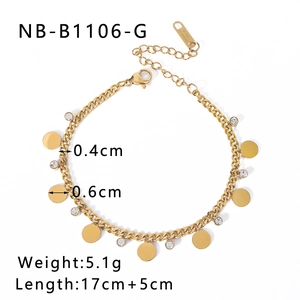 Detailed view of golden titanium steel chain with polished disks and zircon charms