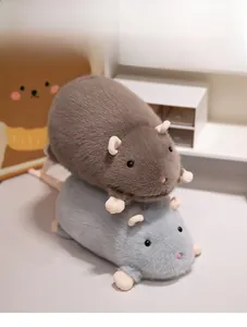Detailed view of cute plush hamster dolls in brown and grey with soft textured fur