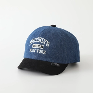 Detailed embroidery of Brooklyn letters on denim colorblock baseball cap for kids