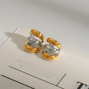 Orecchini a clip moderni a tre strati in acciaio bicolore oro 18k e argento lucido