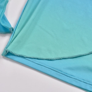 Macro view of double-needle stitching and light blue breathable mesh fabric detail