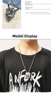 Macro detail of retro bull head pendant and 3mm steel chain on a male model