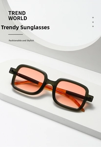 Retro square sunglasses with olive green frames and orange gradient lenses on white display
