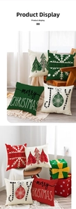 Detailed view of linen Christmas pillow covers with festive tree and snowflake patterns