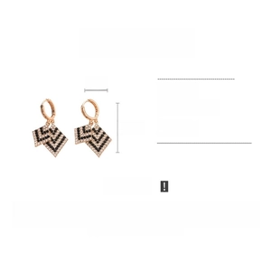 Detail view of rose gold geometric earrings with rhinestones including size specifications