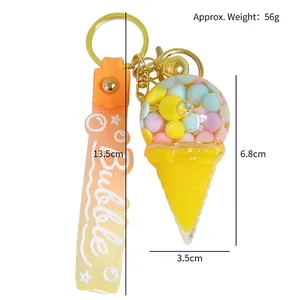 Sweet yellow ice cream keychain with colorful candy beads and orange bubble strap
