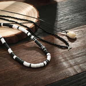 Handmade shell and fish tail beaded necklace set with black and white heishi clay discs