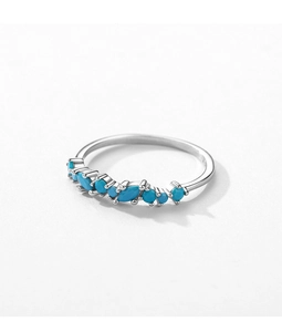 Detailed macro view of S925 sterling silver ring with marquise turquoise stones
