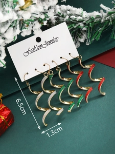 Three pairs of spiral Christmas earrings in gold with silver, green and red glitter