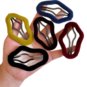 Set of five wavy velvet flocking hair clips in yellow, blue, brown, red, and black colors