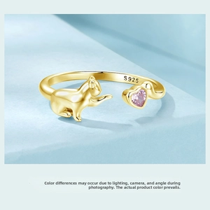 Close-up of S925 sterling silver adjustable ring featuring a pink heart stone and a cat motif