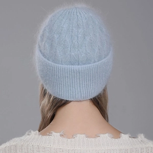 Women's light blue angora rabbit fur knit beanie with cable patterns and ribbed cuff
