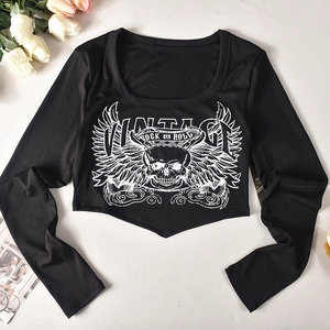 Detailed flat lay of black long sleeve crop top with vintage rock wing and skull print